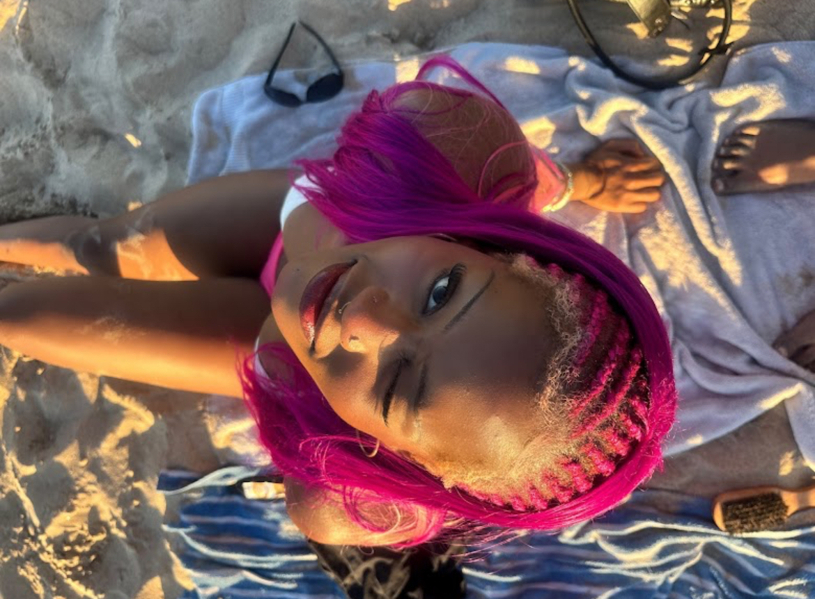 Magenta feed-in braids styled at Gege Hair Salon